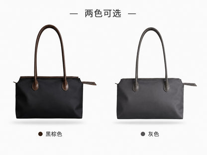 LAYRICH 通勤托特包正面兩色展示，黑棕色與灰色款，防潑水材質搭配真皮細節，適合上班與日常百搭